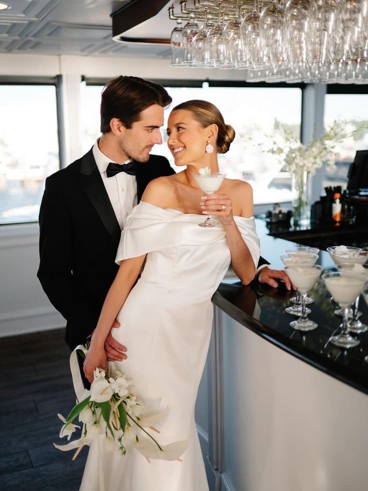 Bride and groom enjoying a private yacht reception